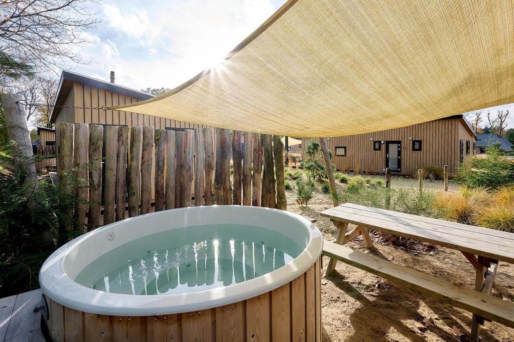 Vakantiepark de IJsvogel Zand Lodge Jacuzzi in Gelderland - foto 3